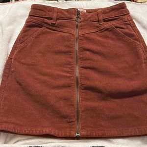 So corduroy burnt orangeish brown skirt